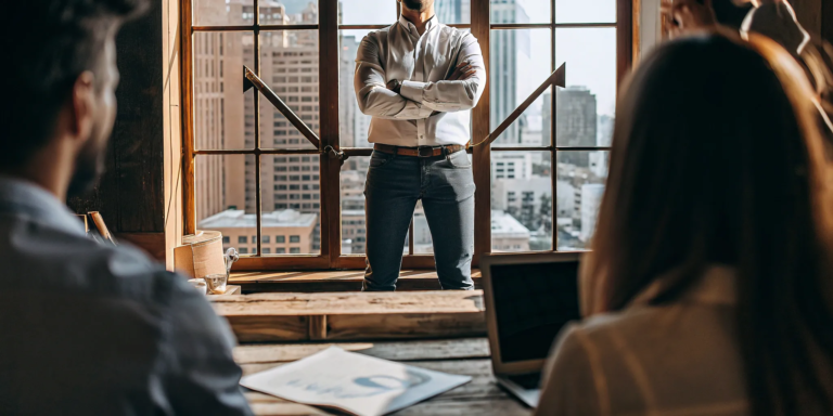 Confident business owner learning how to get a business loan without collateral.