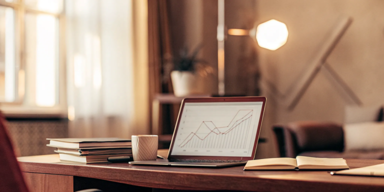 A financial graph on a laptop screen detailing a merchant cash advance example.