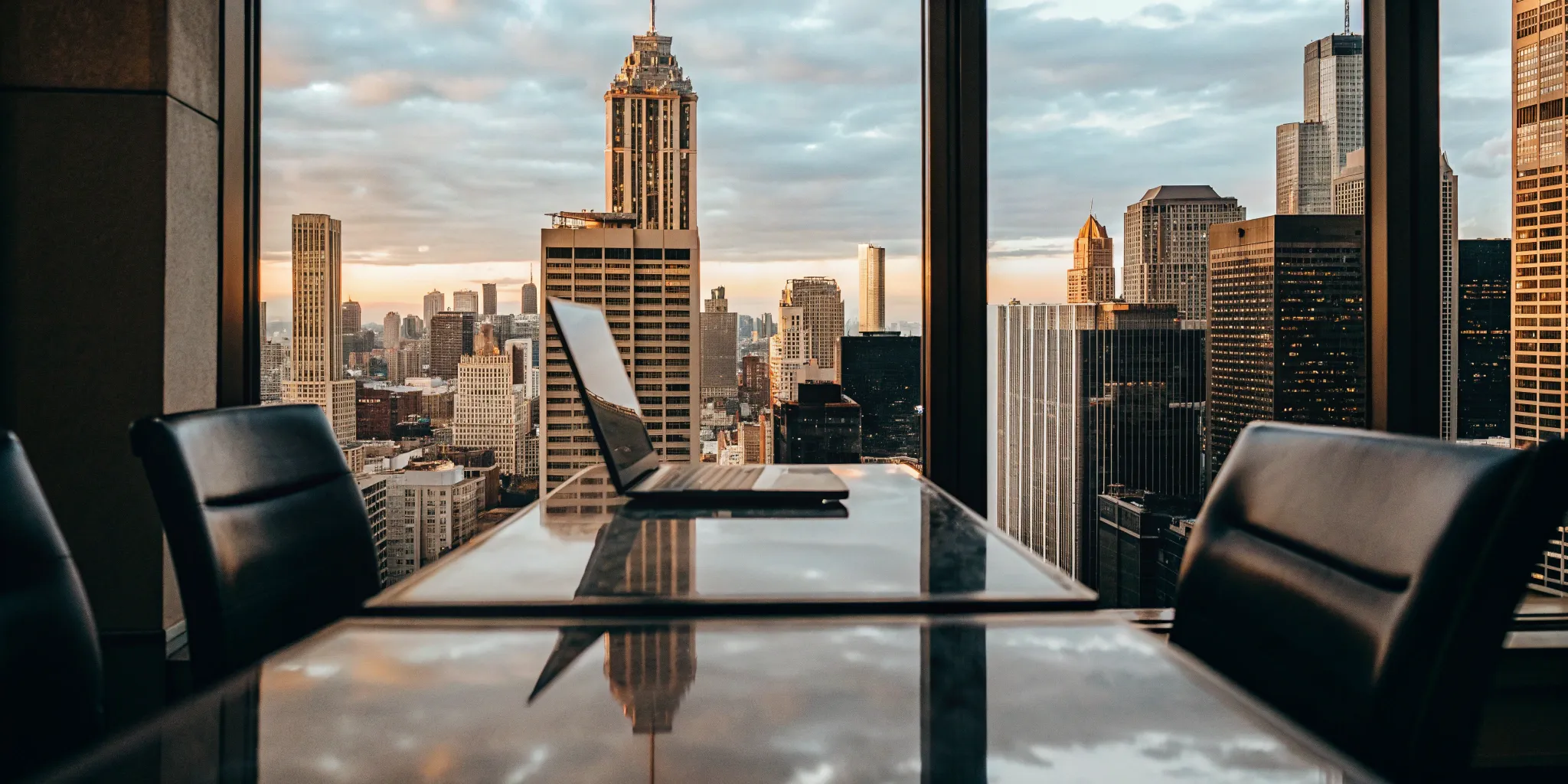 Factoring receivables for a B2B company in a modern Chicago office overlooking the city.