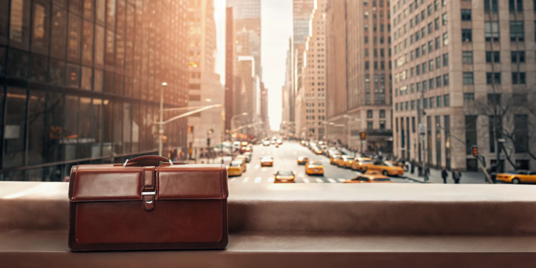 A business briefcase sits above a New York City street, ready for a purchase order financing deal.