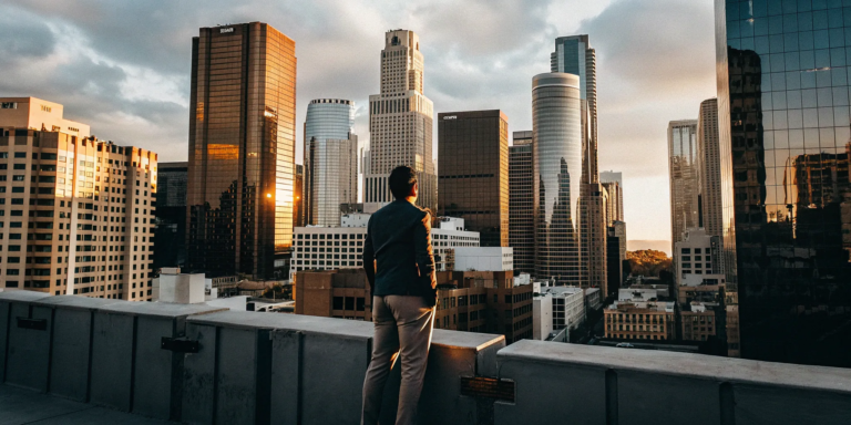 Revenue Based Funding California: What You Need to Know 6 Business owner overlooking Los Angeles considers revenue based financing.