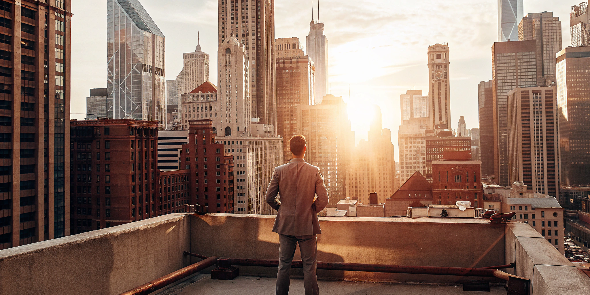 Business owner on a Chicago rooftop planning for alternative business funding.