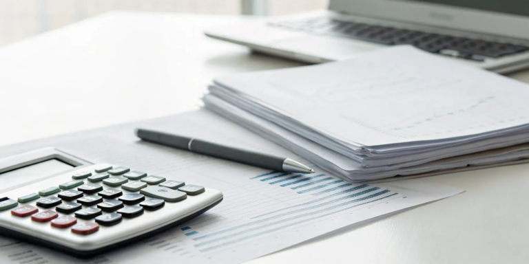Using a factor rate calculator to determine the true APR of a business loan.